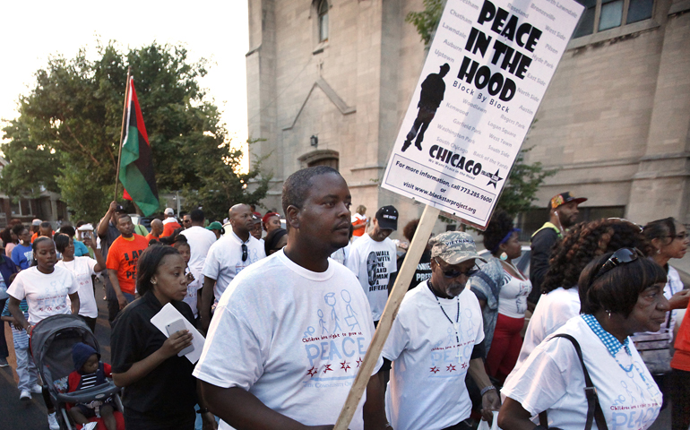 Participants walk during a call for an end to violence in their community June 17 in Chicago. (CNS/Karen Callaway, Catholic New World)
