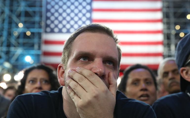People react to election results Nov. 8 at the Jacob K. Javits Convention Center in New York City . (CNS/Andrew Gombert, EPA)