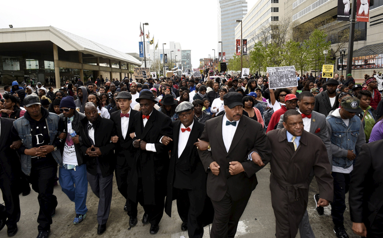 Demonstrators march to City Hall to protest the death of Freddie Gray on April 25 in Baltimore. (CNS/Reuters/Sait Serkan Gurbuz)
