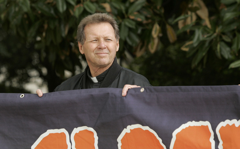 Roy Bourgeois, a Maryknoll priest for 45 years, stands outside a congressional office building in Washington in 2007. (CNS/Paul Haring)