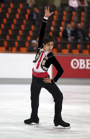 Philippine figure skater Michael Christian Martinez performs in the 2013 Nebelhorn Trophy competition in Oberstdorf, Germany. Martinez, ranked fifth in the World Junior Figure Skating Championships, will be the first skater to represent the Philippines in the Winter Games in Sochi, Russia, in February. (CNS/Robin Ritoss)