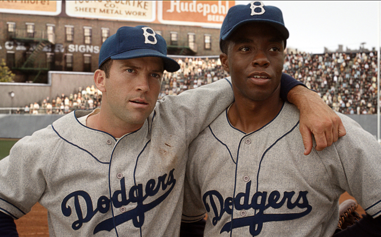Lucas Black and Chadwick Boseman in a scene from "42," one of Sr. Rose Pacatte's favorite films of 2013 (CNS/Warner Bros.)
