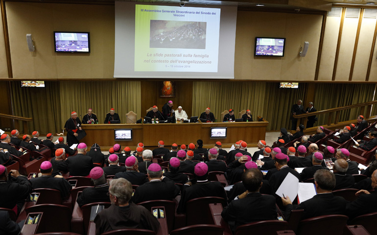 Pope Francis leads the afternoon session on the first working day of the extraordinary Synod of Bishops on the family Monday at the Vatican. (CNS/Paul Haring)