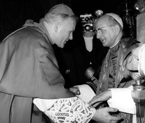 Cardinal Karol Wojtyla, who later became Pope John Paul II, is congratulated by Pope Paul VI