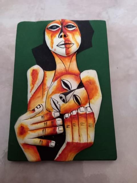 Painting depicts one person cradling another in her hands. Painting depicts one person cradling another in her hands.