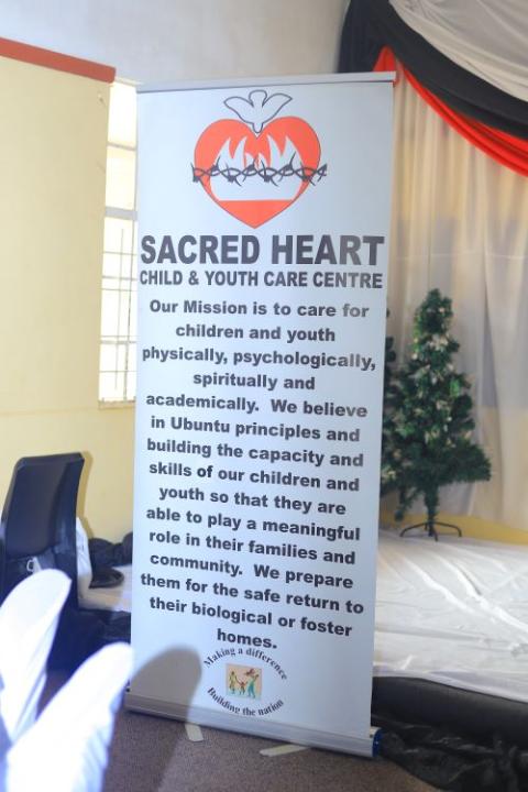 Sign at child center