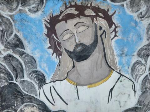 Flores is the only predominantly Roman Catholic island in the Indonesian archipelago, and religious street murals, like this one in the city of Maumere depicting the crucifixion of Jesus, are common. (GSR photo/Chris Herlinger)