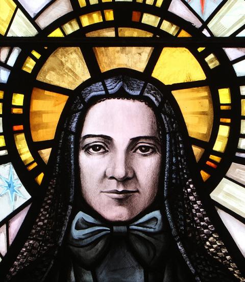 St. Frances Xavier Cabrini, patron of immigrants, is depicted in a stained-glass window at the saint's shrine chapel in New York City. (OSV News/Gregory A. Shemitz)