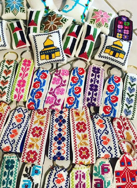 An example of tatreez, traditional Palestinian embroidery, on keychains (Wikimedia Commons/Noormalfoof)