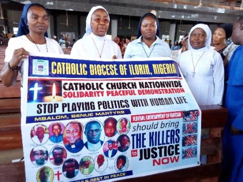 Cecilia Nduaguba and sisters The author and sisters from other congregations in the Catholic Cathedral of Ilorin, Kwara State, Nigeria, during a national march in 2017 to protest the killing of two priests and members of their parish while they were at Mass. (Cecilia Nduaguba)