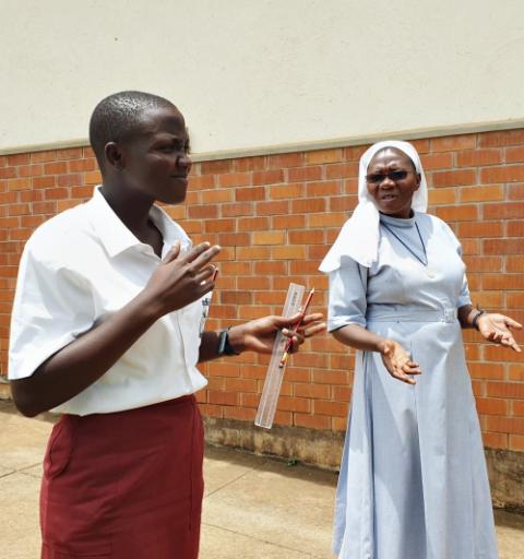 Sr. Rose Nelima converses with one of her deaf students at Mbale School for the Deaf in Uganda. (Gerald Matembu) Sr. Rose Nelima converses with one of her deaf students at Mbale School for the Deaf in Uganda. (Gerald Matembu)