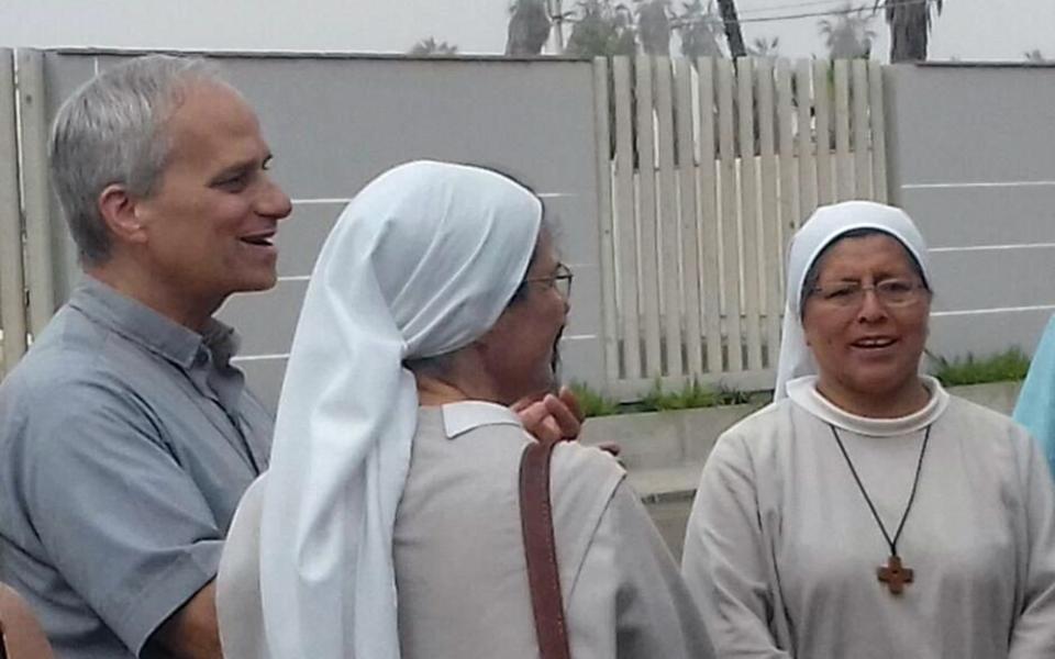 The future Pope Leo XIV visits with Augustinian sisters in Peru in this undated photo. As an Augustinian priest, then-Father Robert F. Prevost spent many years as a missionary in Peru and also served as bishop of that country's Chiclayo Diocese. (OSV News/Courtesy of Augustinian Sr. Carmen Toledano)
