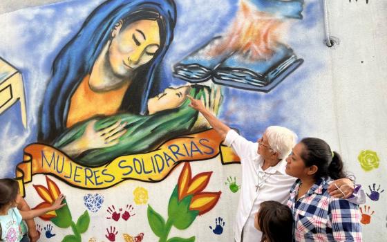 Social Service Sr. Virginia Bahena stands with a single mother from the community she serves in Nuevo Laredo, Mexico.
