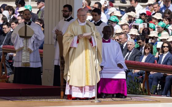 Cardinal Pietro Parolin, former Vatican secretary of state, reads his homily while celebrating Mass on the second day of the second day of the "novendiali" -- nine days of mourning for Pope Francis marked by Masses -- in St. Peter's Square April 27, 2025. (CNS photo/Pablo Esparza)