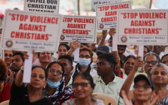 People hold placards during a protest in Mumbai, India, April 12, 2023, against what they claim are attacks on the Christian community, churches and institutions across India. (OSV News/Reuters/Francis Mascarenhas)