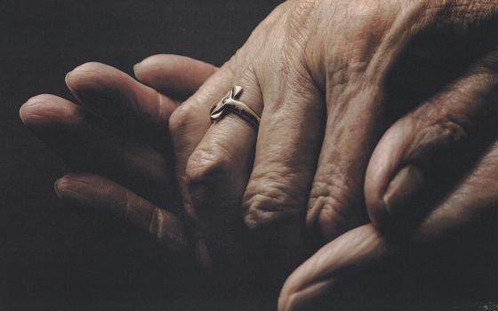 Displaying a sister's profession ring are the hands of a sister from the Society of the Holy Child Jesus, one of the congregations who took part in Sexton's research. This image was used in Sexton's book cover. (Courtesy of Catherine Sexton)