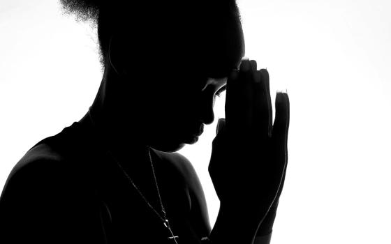 Silhouette of a person praying (Unsplash/Adegbenro Emmanuel Dipo)