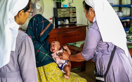 Salesian sisters treat a baby at Our Lady of Lourdes Hospital in Baromari, Sherpur, Bangladesh. According to recent data by UNICEF, more than 100,000 children in Bangladesh died before their fifth birthday in 2023, and almost two-thirds of these deaths occurred within the first 28 days of life. (GSR photo/Stephan Uttom Rozario)