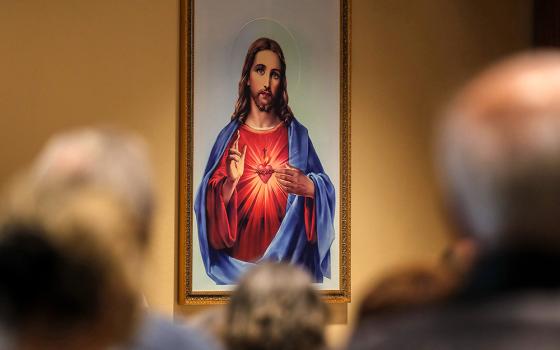 A painting of the Sacred Heart of Jesus is seen during Palm Sunday Mass at Sacred Heart Church in Prescott, Ariz., April 13, 2025. (OSV News/Bob Roller)
