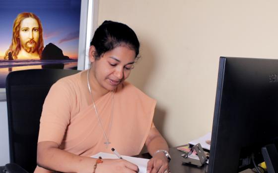 Sr. Lini Sheeja working in her office in 2020