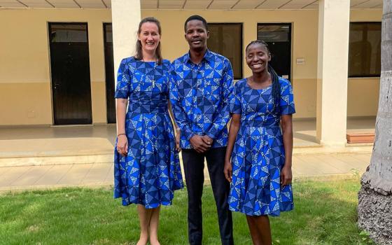 From left, Scalabrinian Sr. Carla Luisa Frey Bamberg, Christopher Joseph and Blessed Bucon, colleagues from the Episcopal Commission for the Pastoral Care of Migrants and Itinerant People, after a workshop in Luanda, Angola (Courtesy of Carla Luisa Frey Bamberg)