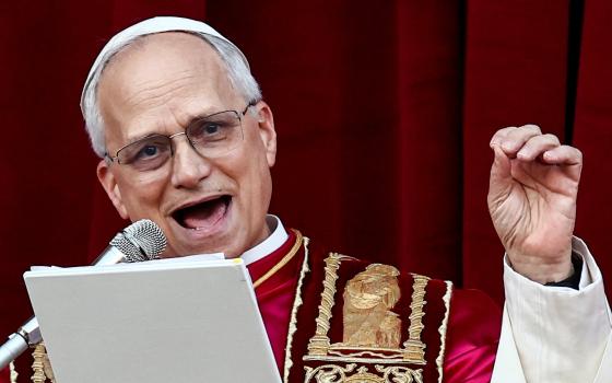Pope Leo XIV speaks on the central balcony of St. Peter's Basilica at the Vatican May 8, 2025, following his election during the conclave. (OSV News photo/Yara Nardi, Reuters)