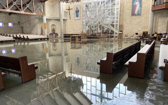 The sanctuary of St. Albert the Great Church in Austin, Texas, is seen Feb. 16, 2021. An overhead sprinkler burst during the historic winter storm that hit the state and dumped 10,000 gallons of water into the sanctuary. (CNS/Catholic Spirit/Fr. Charlie G
