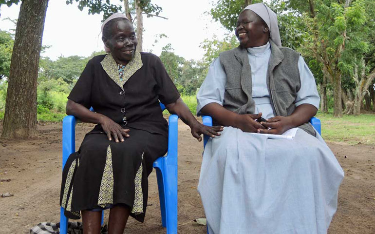 Angelika Ouma, left, the director of the Bishop Caesar Asili Memorial Nursery and Primary School, and head teacher Sr. Laura Kaneyo sit outside the school. Angelika Ouma, left, the director of the Bishop Caesar Asili Memorial Nursery and Primary School, and head teacher Sr. Laura Kaneyo sit outside the school.